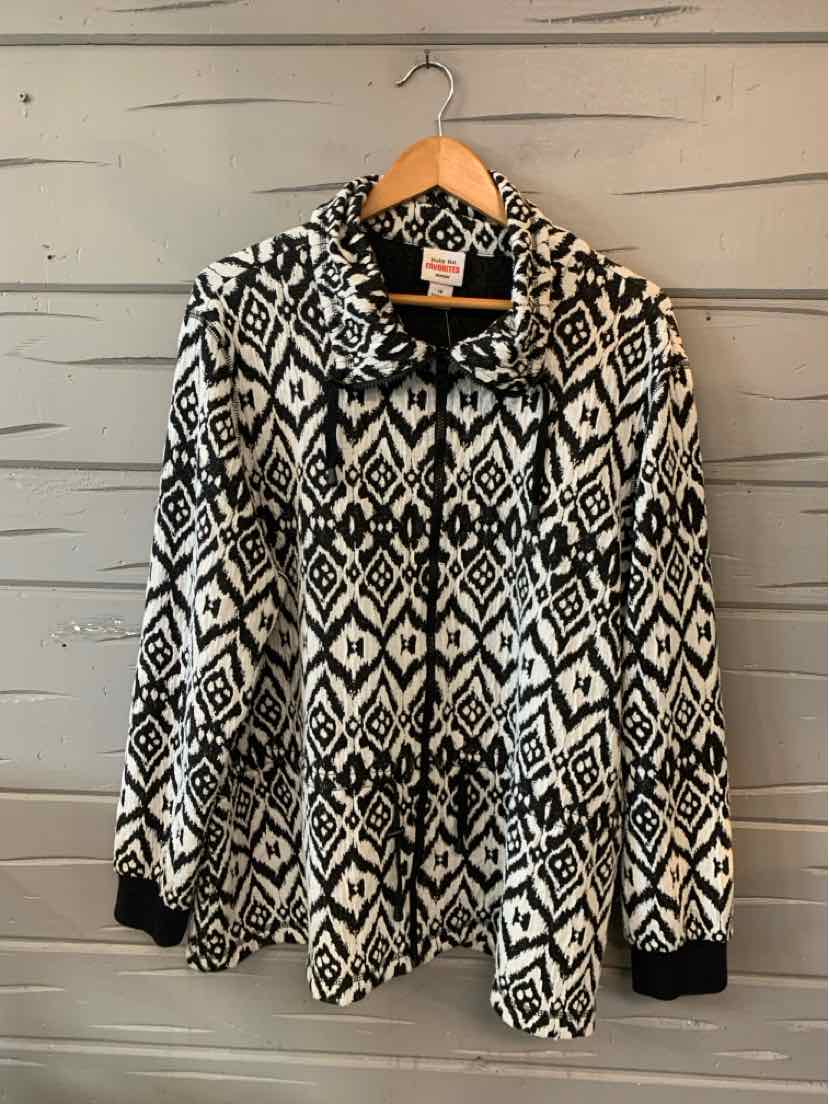 Black and white geometric patterned long-sleeve jacket with zipper and ribbed cuffs in size 1X.