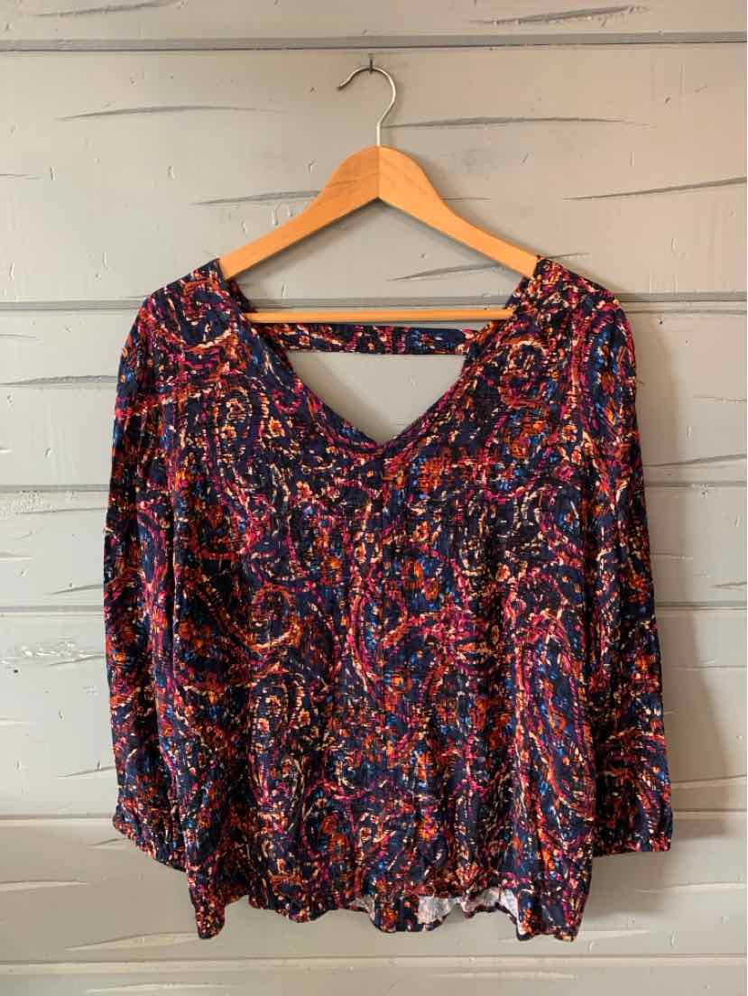 Women's long-sleeve blouse with vibrant multicolor abstract pattern and a V-neck cutout back in size XL.