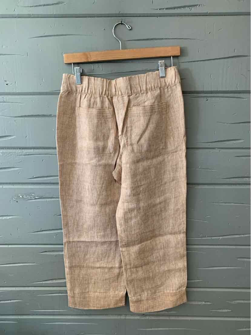 Beige linen blend wide-leg pants with an elastic waistband and cropped length.