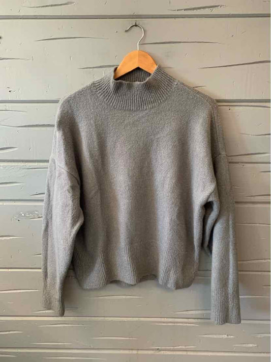 Gray Ann Taylor women’s sweater with a soft knit texture, high neckline, and long sleeves.
