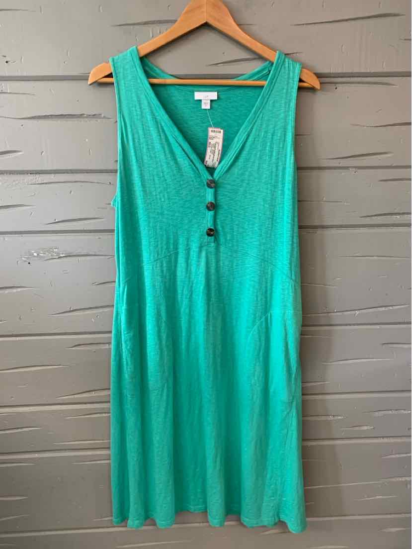 Sleeveless turquoise dress with V-neck and three front buttons, lightweight fabric, knee-length.