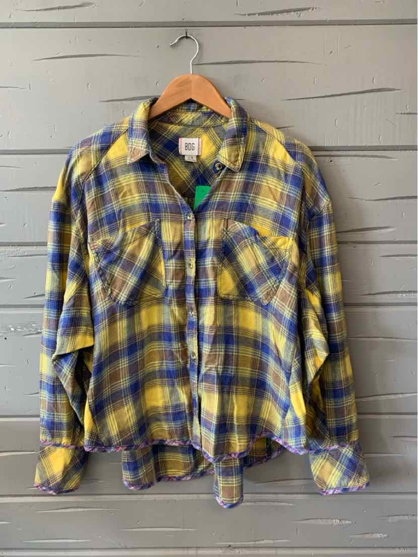 Yellow and blue plaid flannel shirt with long sleeves and two chest pockets, size large.
