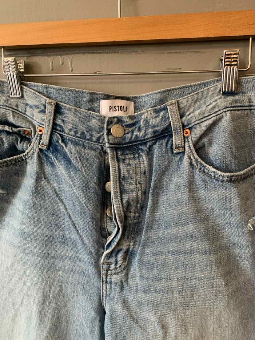 Light wash denim jeans with high waist, button fly, and front pockets.