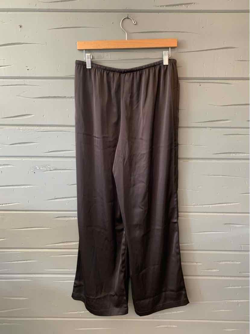 Black wide-leg pants with elastic waistband, lightweight fabric, and relaxed fit.