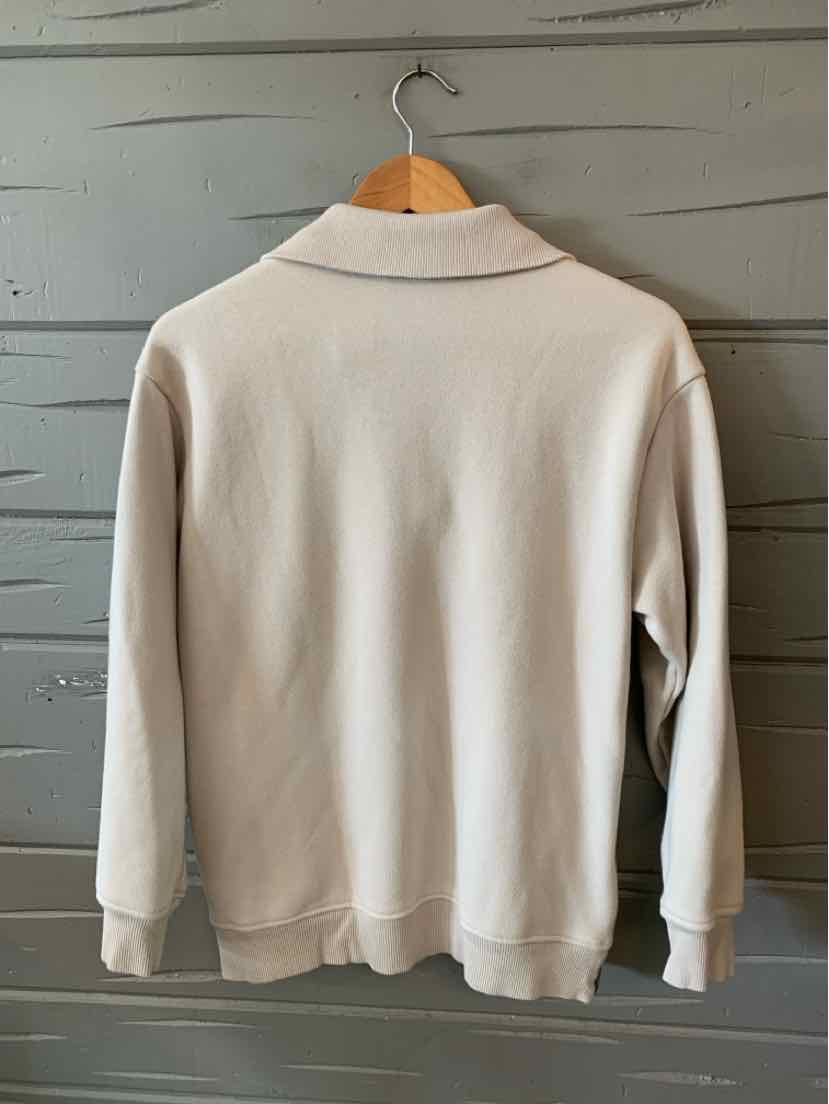 Tan long-sleeve pullover with collar, ribbed cuffs, and soft fabric, size small.