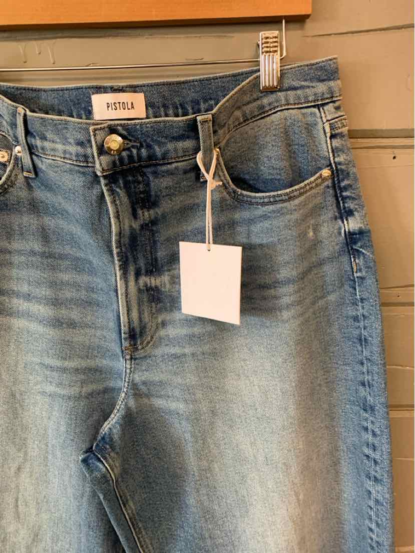 Light blue high-waisted denim jeans with five-pocket design and front button closure.
