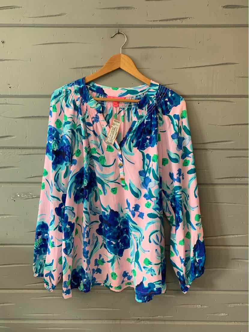 Long-sleeve XL pullover with pink base and large blue floral print, lightweight fabric.
