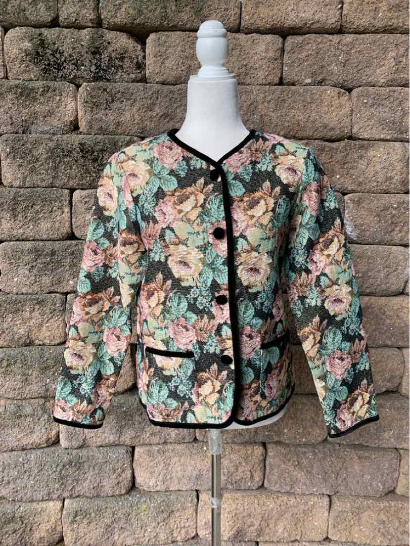Women's floral multicolor blazer with black trim, front buttons, and patch pockets.