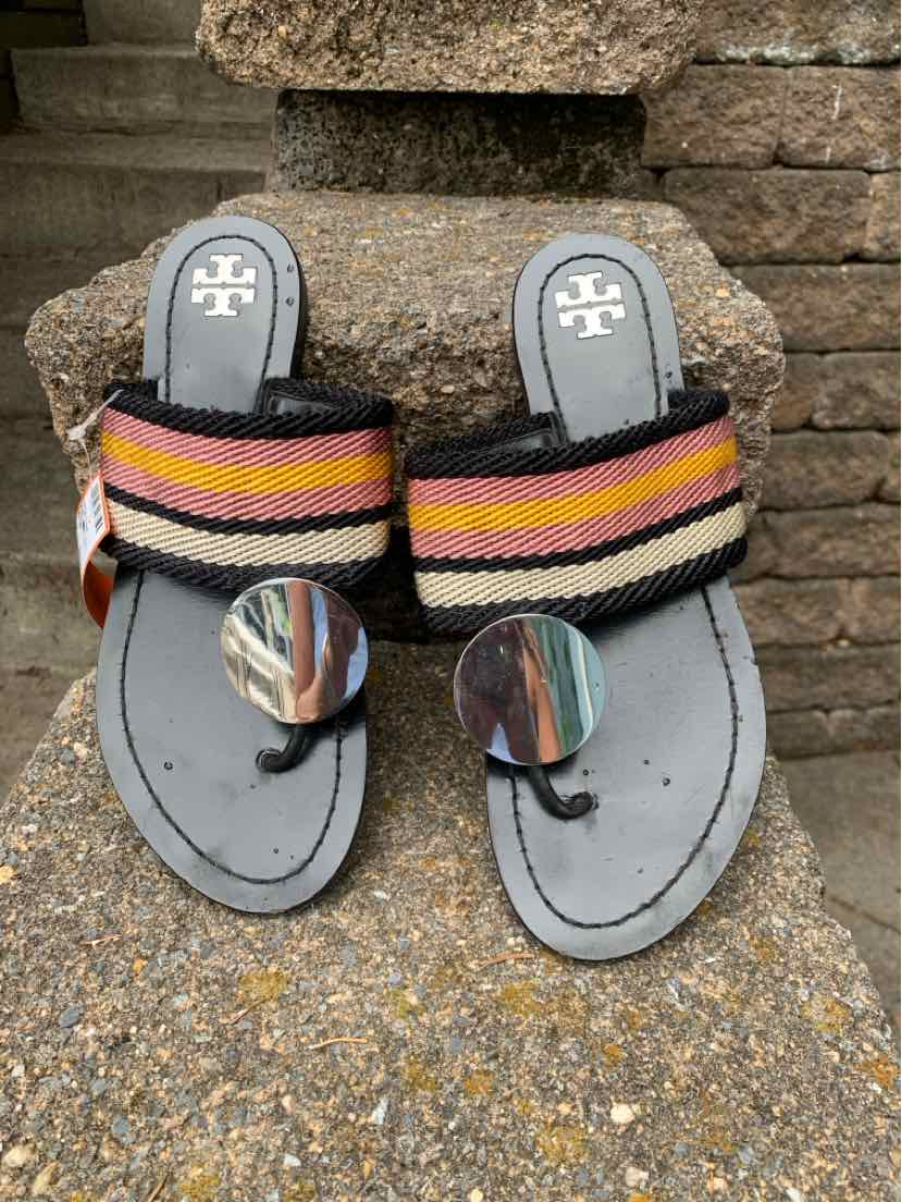 Black Tory Burch size 8 woven sandals with multicolor striped fabric straps and circular metallic toe rings.