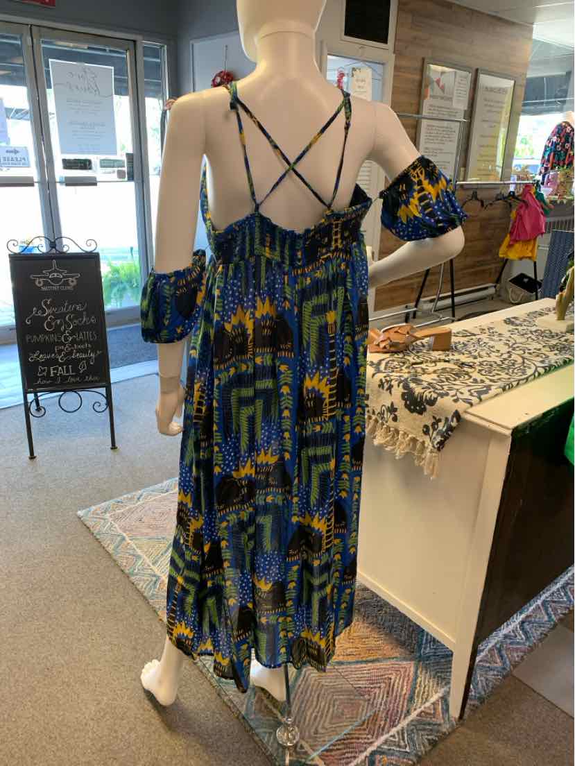 Blue patterned midi dress with spaghetti straps and off-shoulder puff sleeves on mannequin.