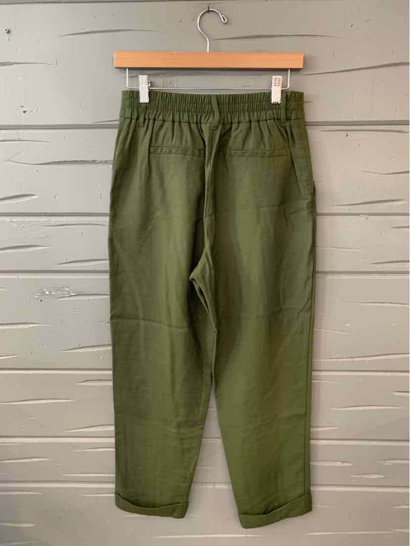 Olive green straight-leg pants with elastic waistband and side pockets, size 4.