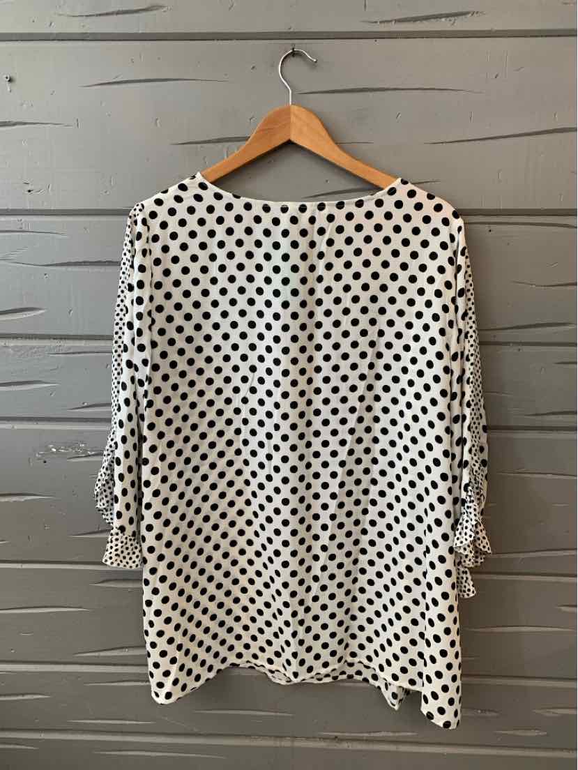 White long-sleeve blouse with black polka dots and tie details on sleeves, size 1X.