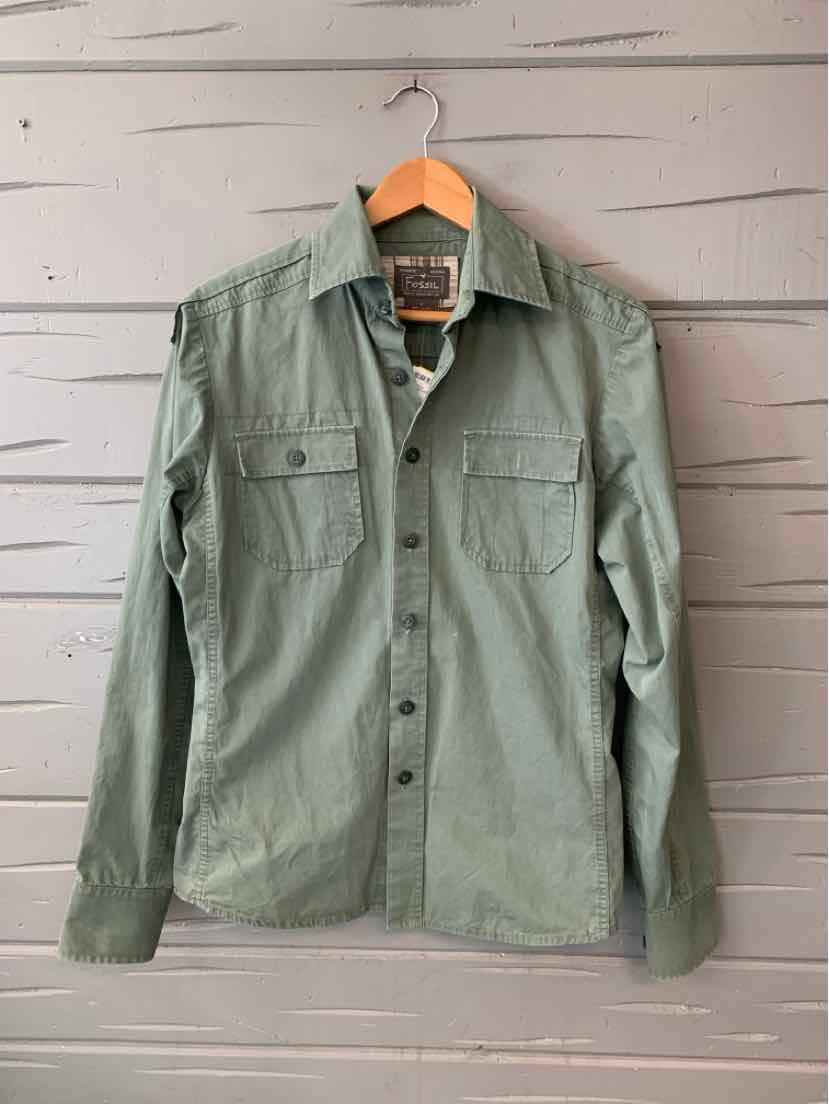 Light olive green long-sleeve button-up shirt with chest pockets and collar on wooden hanger.