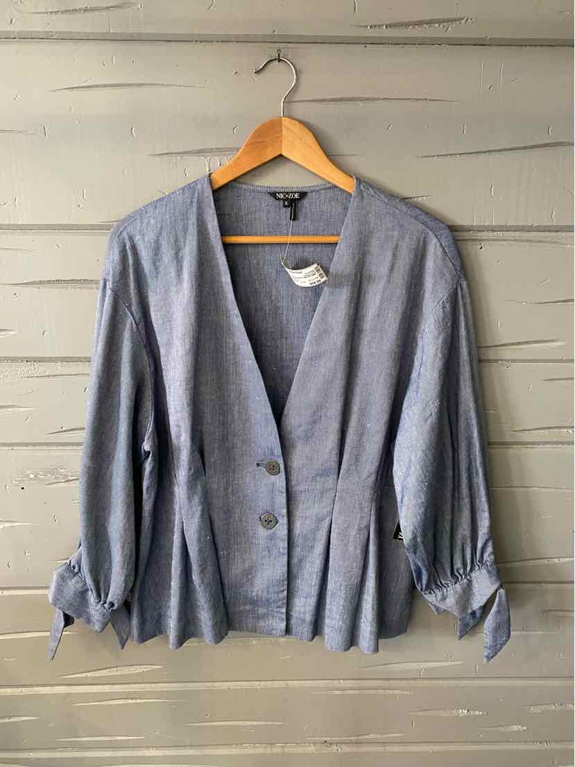 Light blue button-up cardigan with long sleeves and tie details at cuffs, size XL.