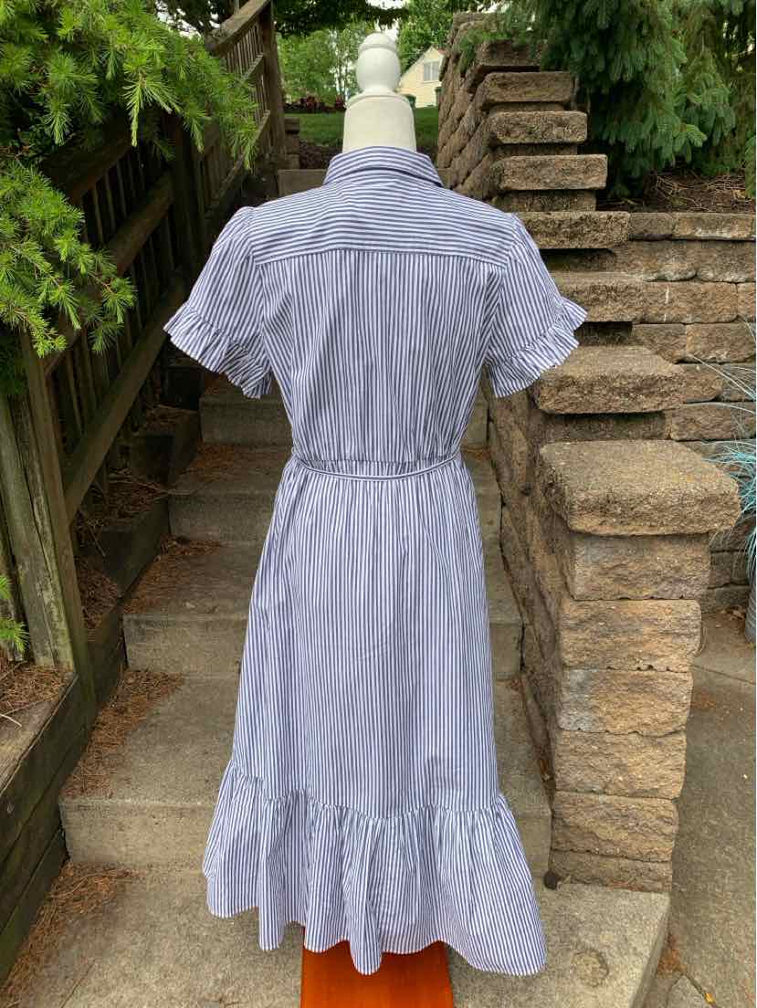 Light blue striped midi dress with short sleeves, cinched waist, and ruffled hem.