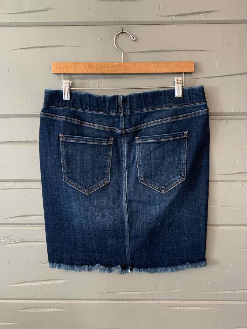 Dark blue denim skirt with back pockets and frayed hem, size 8, hanging on wooden hanger.