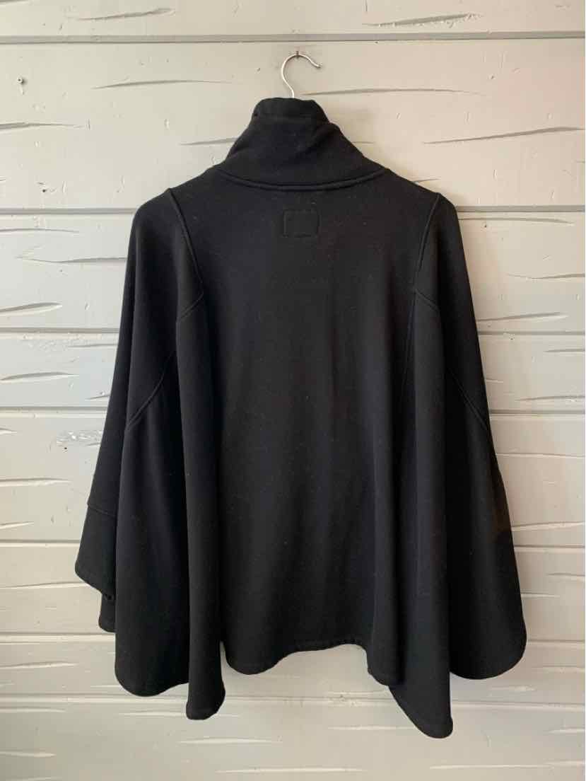 Black UGG women's poncho with a draped silhouette, wide sleeves, and a high folded collar.