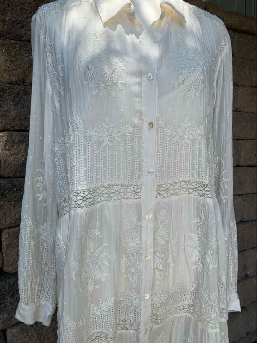 White long-sleeve dress with lace detailing and buttons down the front, medium size.