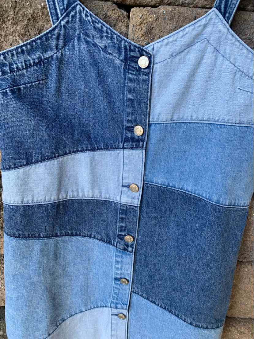 Blue patchwork denim dress with button-down front and spaghetti straps.