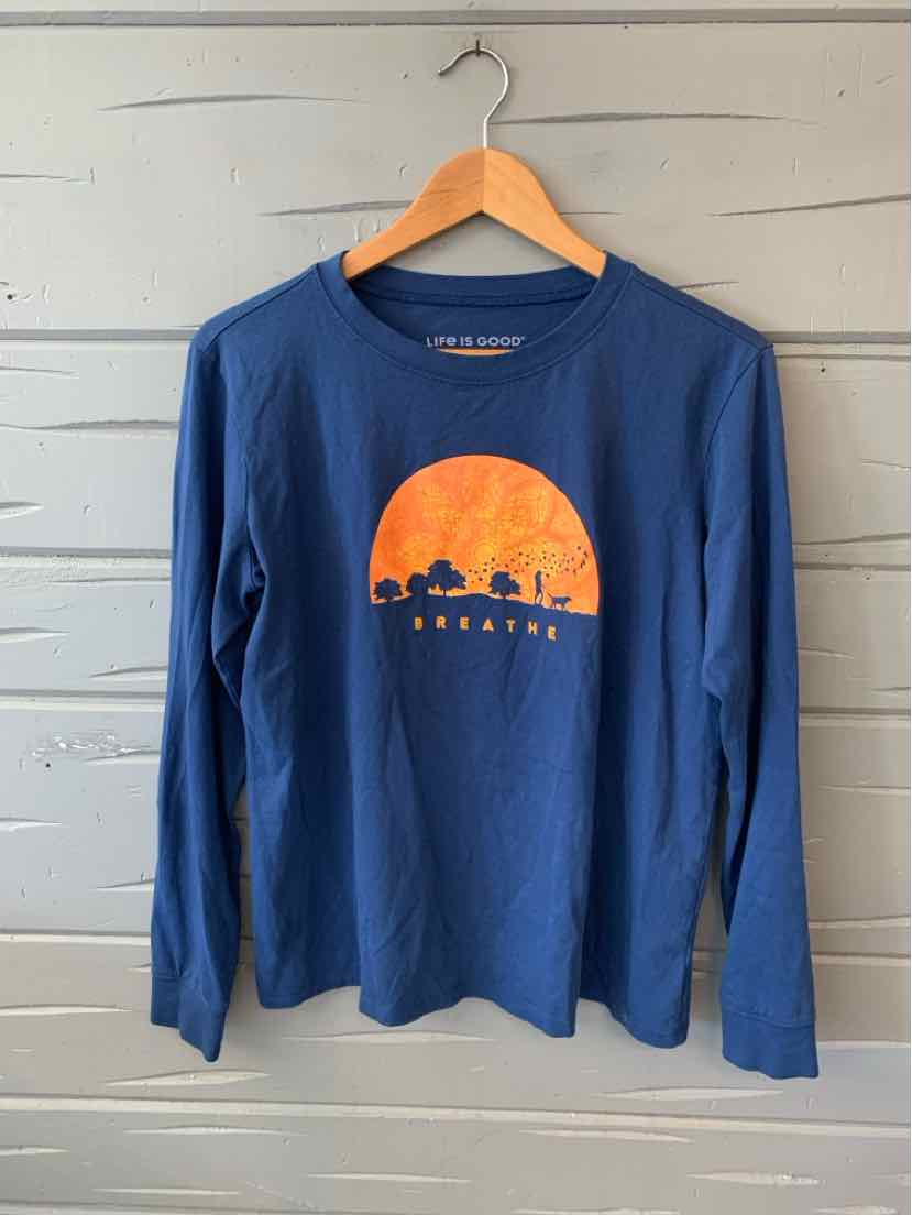 Navy blue long-sleeve shirt with orange sunset graphic and silhouette of trees and text "Life is Good" on front.
