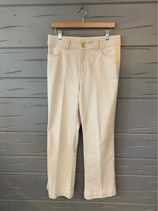 Cream-colored straight-leg pants with front pockets and button closure, size 10P.