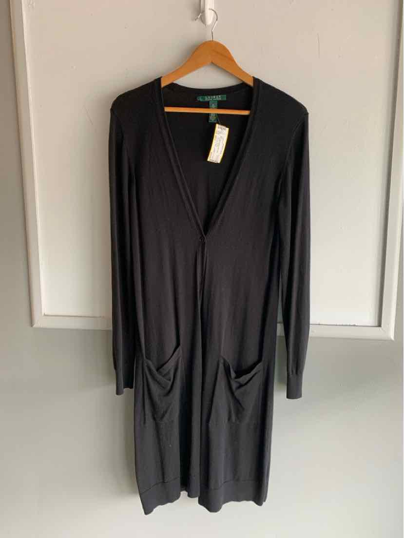 Black long-sleeve knee-length cardigan with two front pockets and a V-neck collar, hanging on wooden hanger.