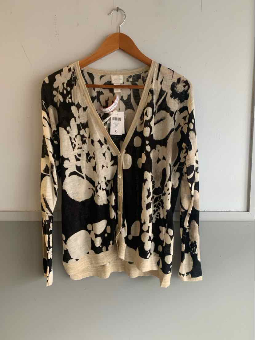 Black and beige floral print cardigan with button front and long sleeves, size small.