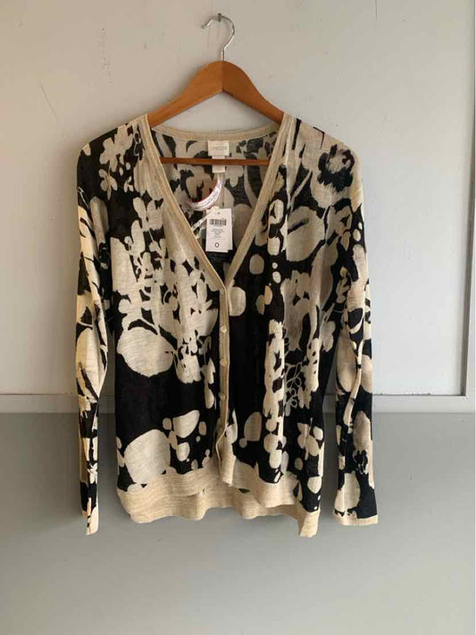 Black and beige floral print cardigan with button front and long sleeves, size small.