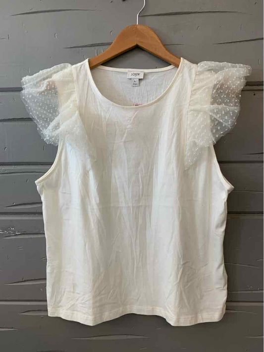 White sleeveless top with ruffled lace cap sleeves and round neckline on wooden hanger.