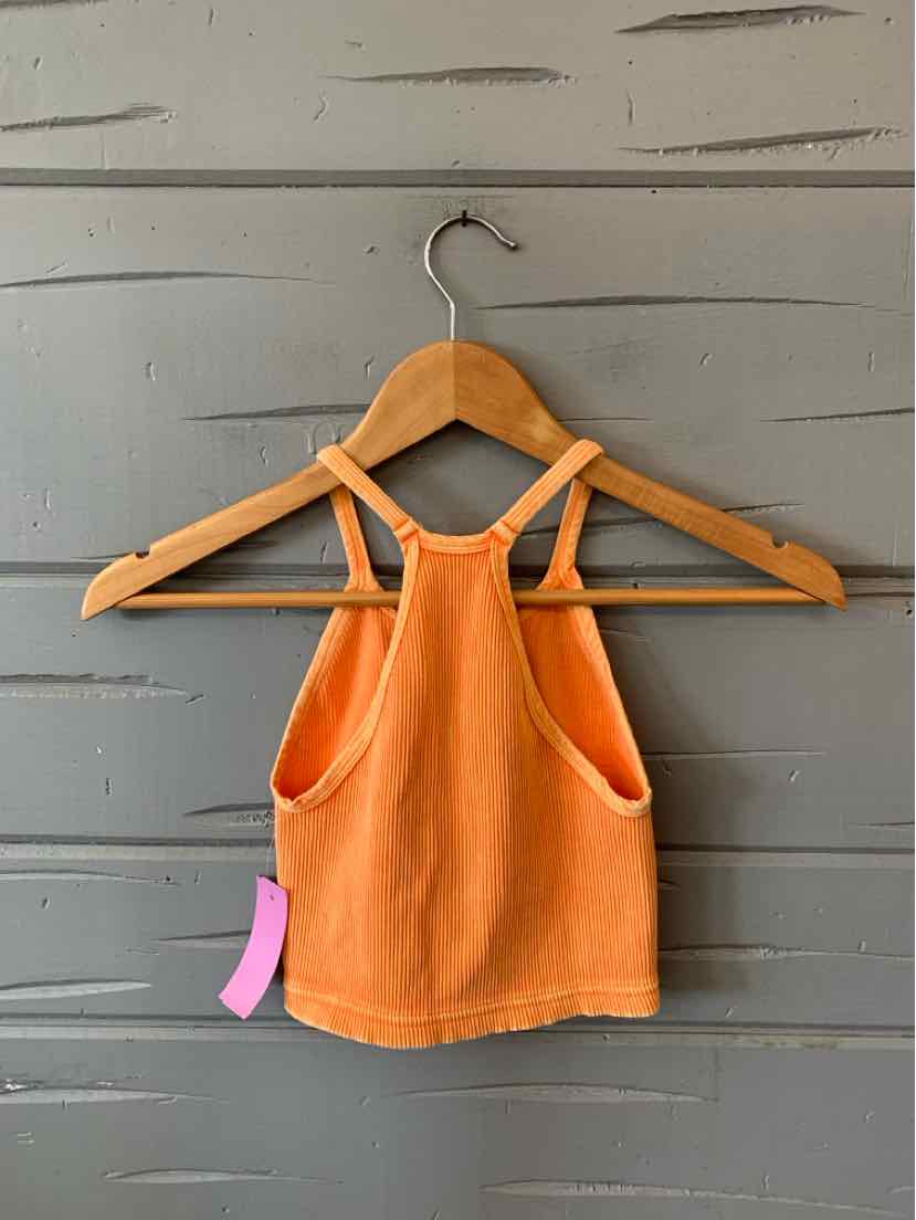 Orange cropped tank top with double thin shoulder straps and a ribbed texture.