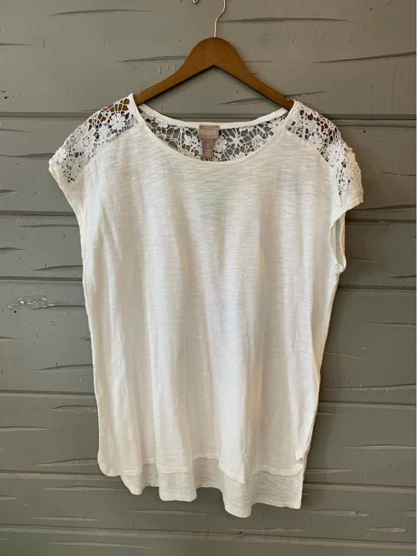 White short-sleeve blouse with lace shoulder detail and rounded neckline on wooden hanger.