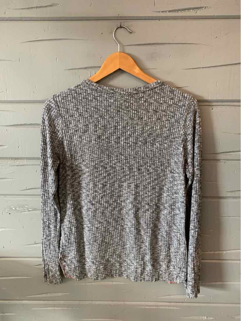 Long-sleeve marled gray knit sweater with a crew neckline hanging on wooden hanger.
