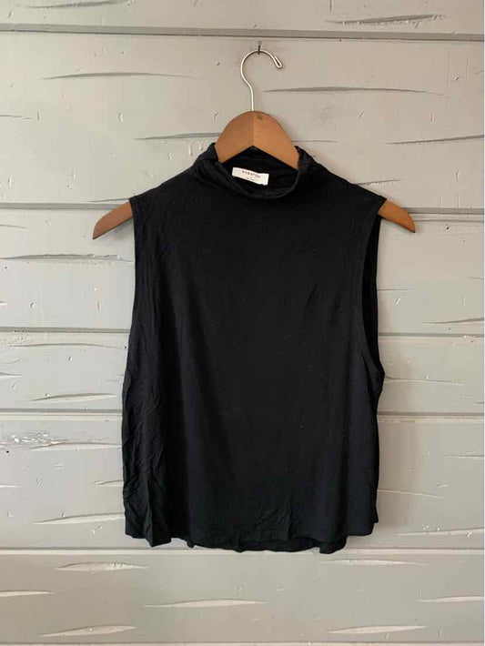 Black sleeveless turtleneck top with a slim fit on a wooden hanger.