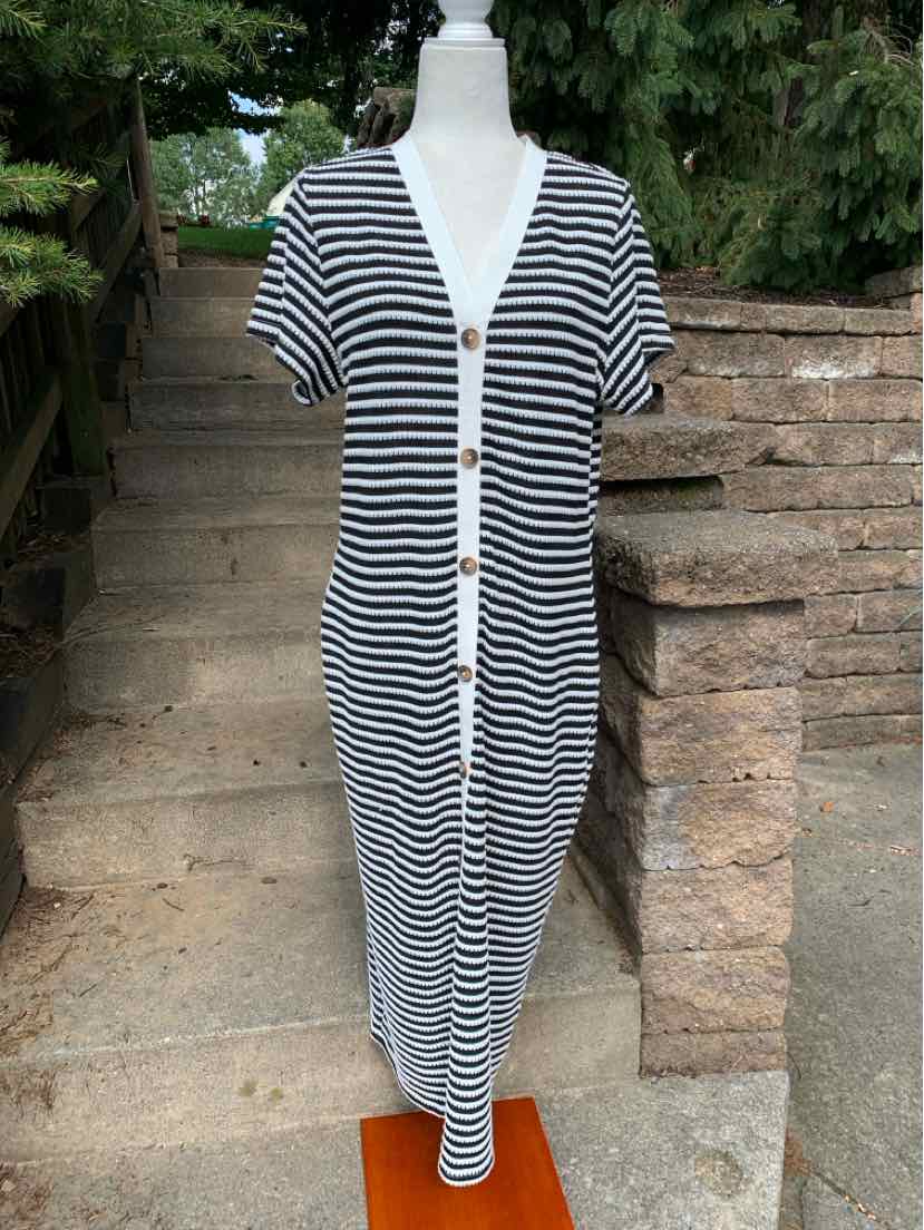 Black and white horizontal striped short-sleeve button-down dress with V-neck and midi length.
