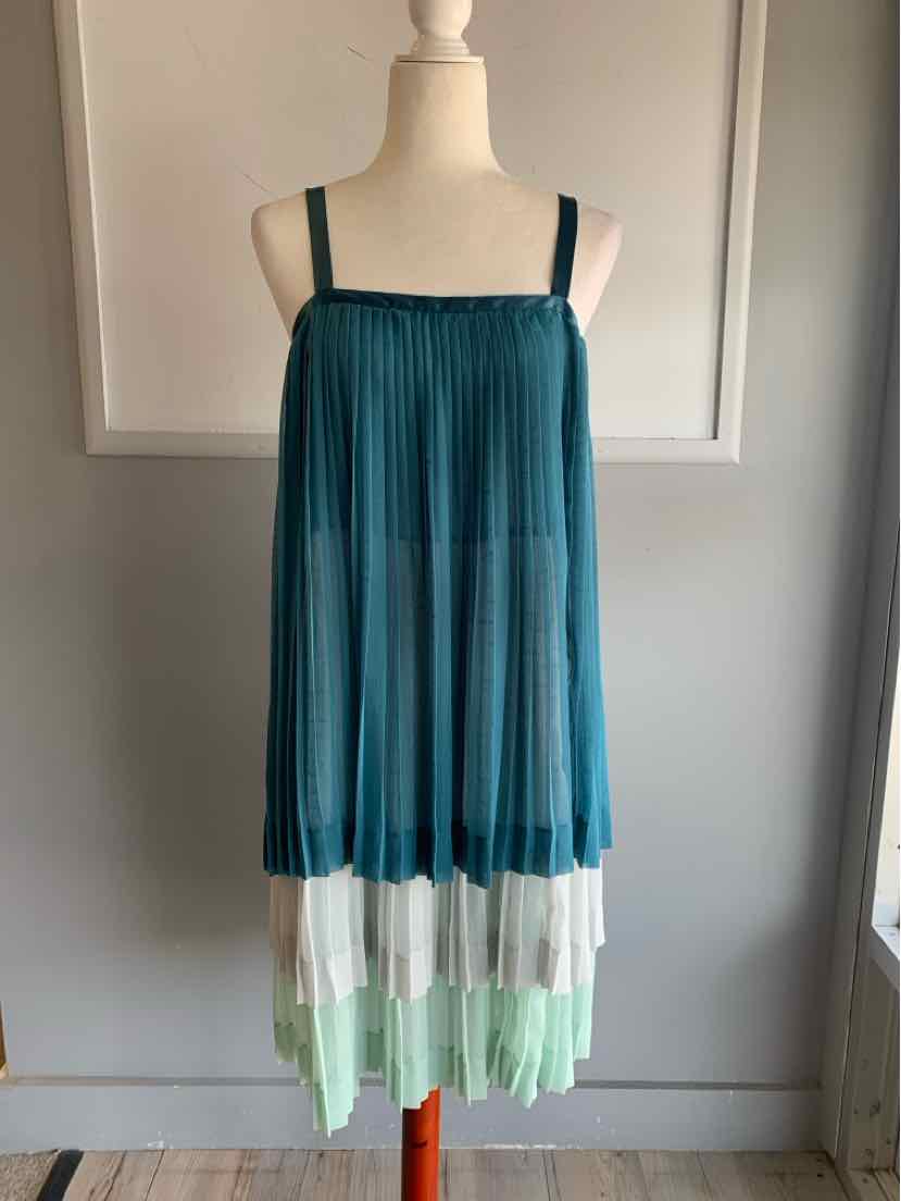 Teal pleated sleeveless dress with square neckline and color-blocked hem in white and mint green.