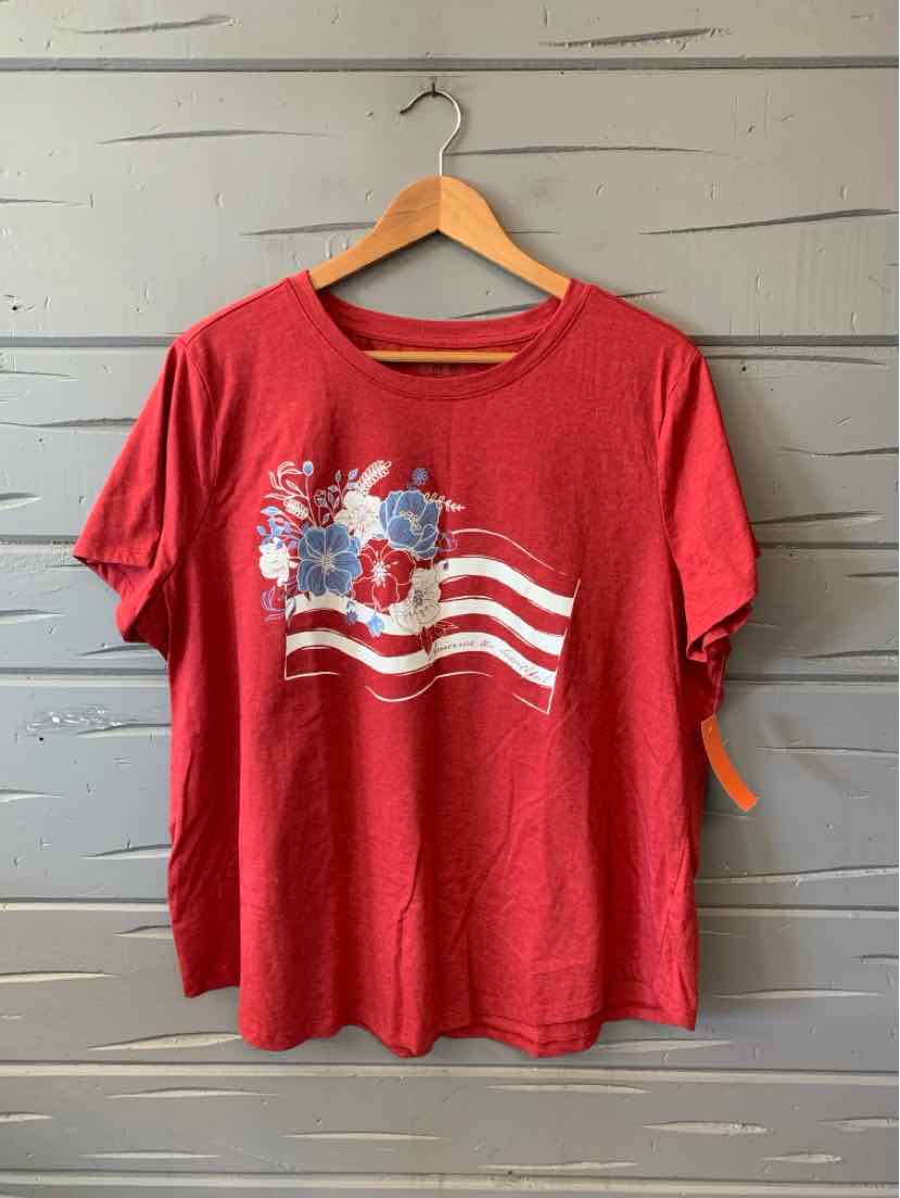 Red short-sleeve cotton t-shirt with white and blue floral graphic and wavy stripes across front.