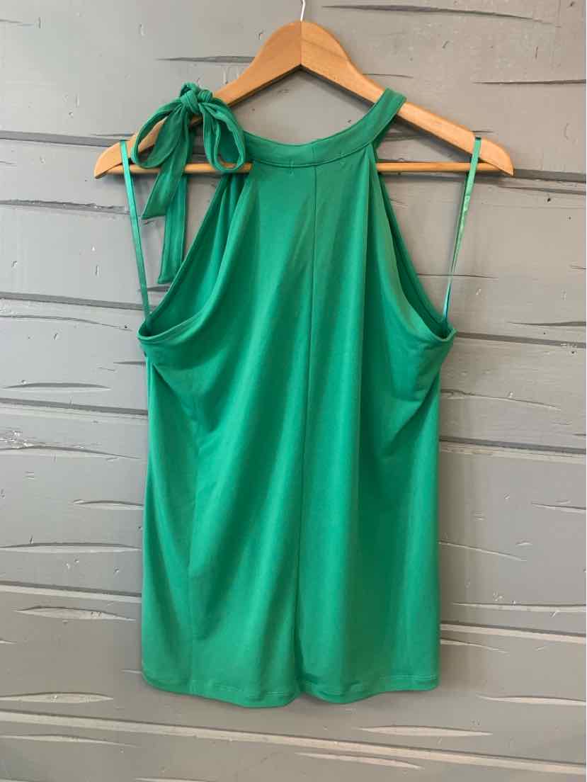 Green sleeveless top with tie shoulder straps and high rounded neckline on wooden hanger.