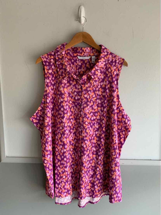 Sleeveless multicolor floral blouse in purple and pink, size 3X, with a collar and button front.
