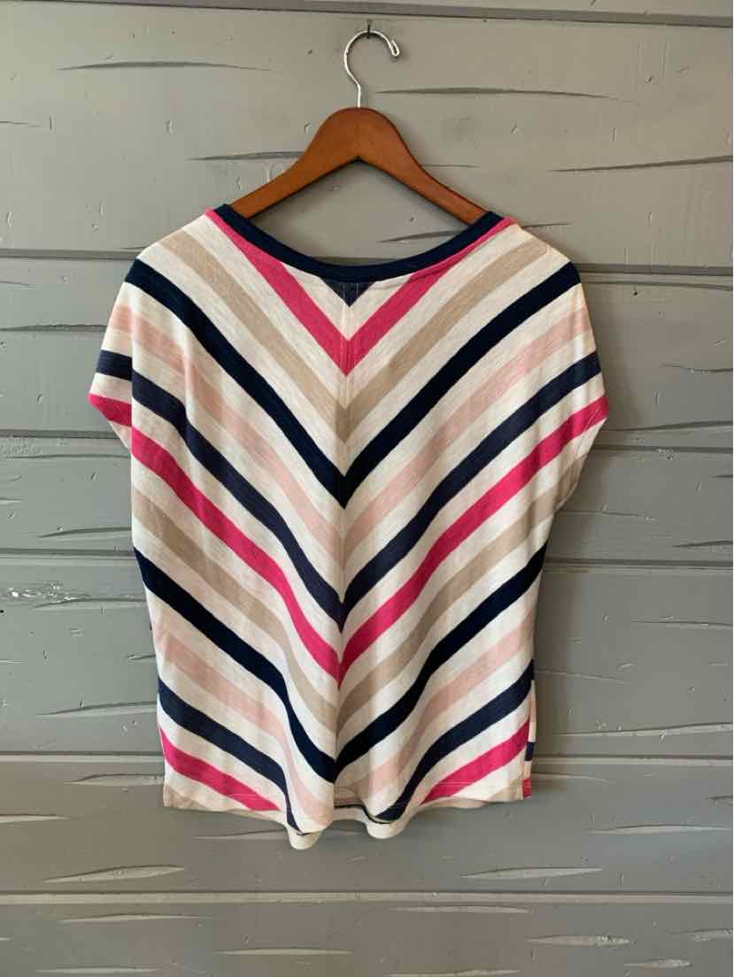 Short-sleeve knit top with V-shaped multi-color stripes in navy, white, cream, and pink on a soft fabric.