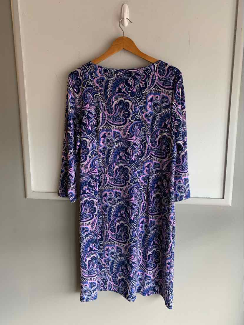 Long-sleeve paisley dress in shades of blue, purple, and pink with a round neckline and knee-length cut.