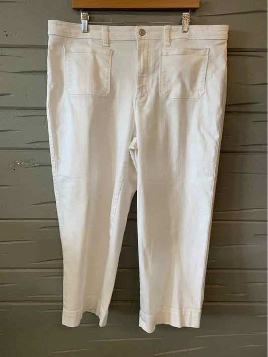 White denim jeans in size 16 with front and back pockets, straight leg cut, and button closure.