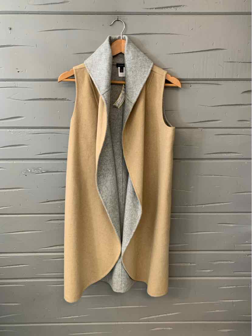 Sleeveless tan vest with gray inner lining and wide, draped collar in a soft fabric.