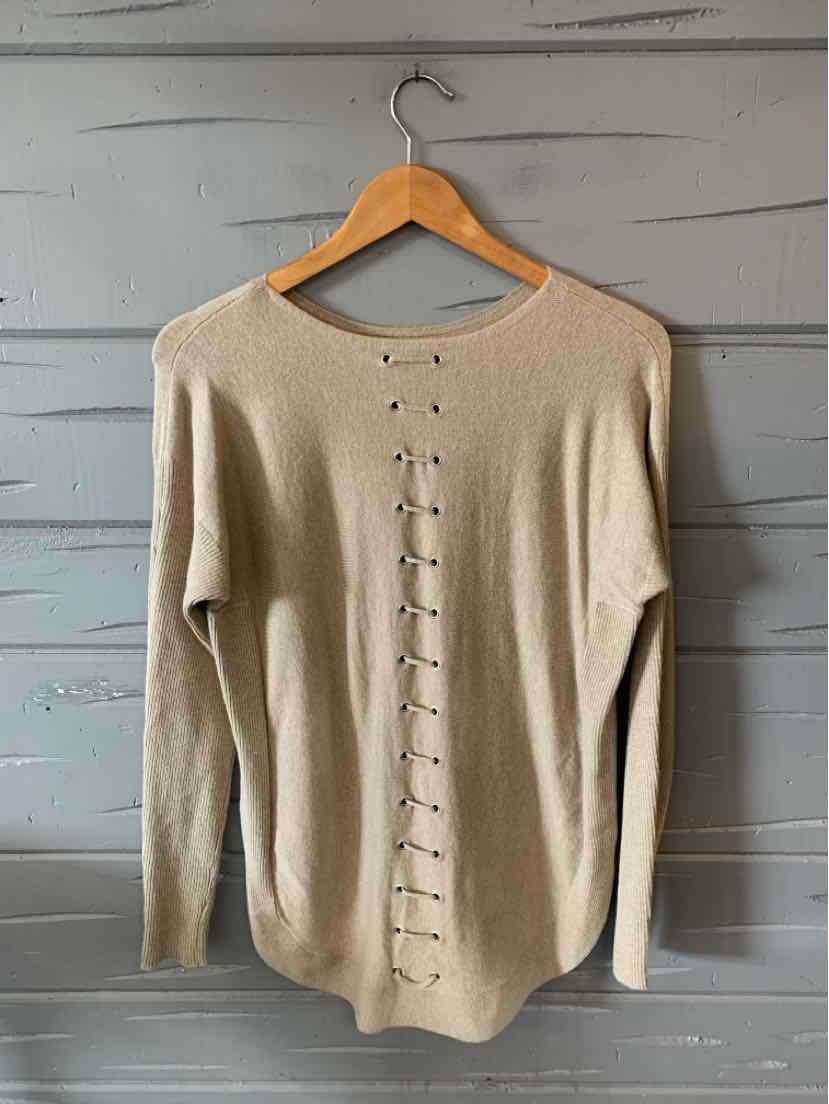 Tan knit long-sleeve sweater with lace-up detail running down the back center, large size.