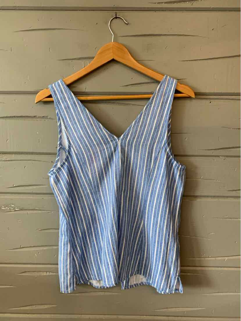 Sleeveless blue and white vertical striped blouse with V-neck on wooden hanger.