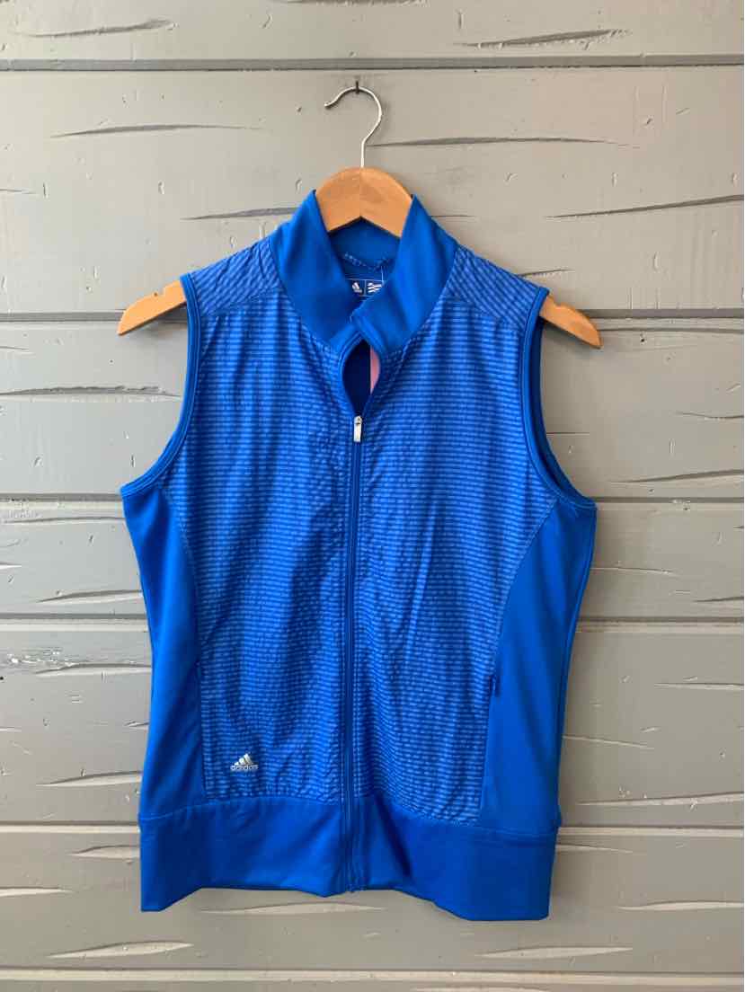 Blue sleeveless zip-up athletic vest with ribbed hem and small logo on lower front.