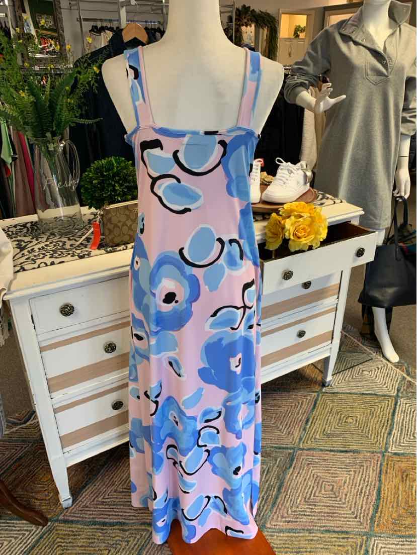Blue midi dress with pink and black floral pattern and spaghetti straps on mannequin.