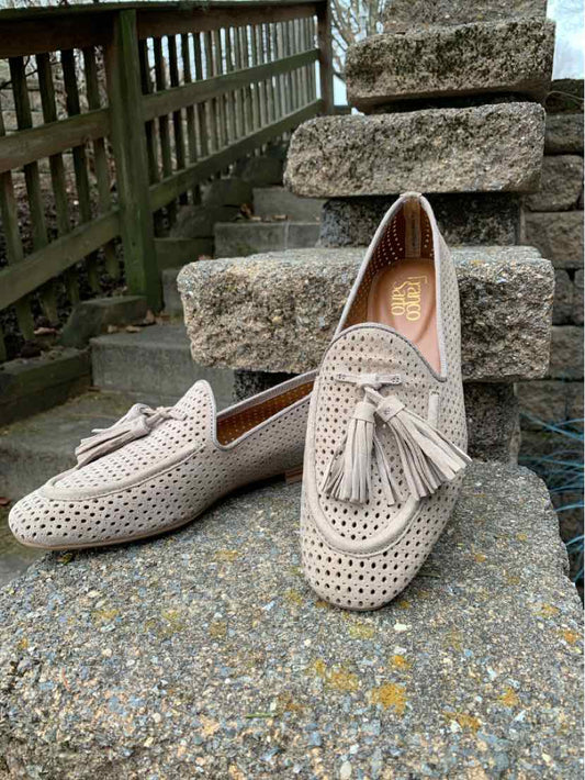 Beige perforated leather loafers with tassels and rounded toes, size 7, by Franco Sarto.