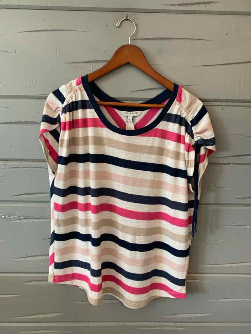Short-sleeve striped t-shirt with navy, pink, beige, and white horizontal lines and a navy neckline.