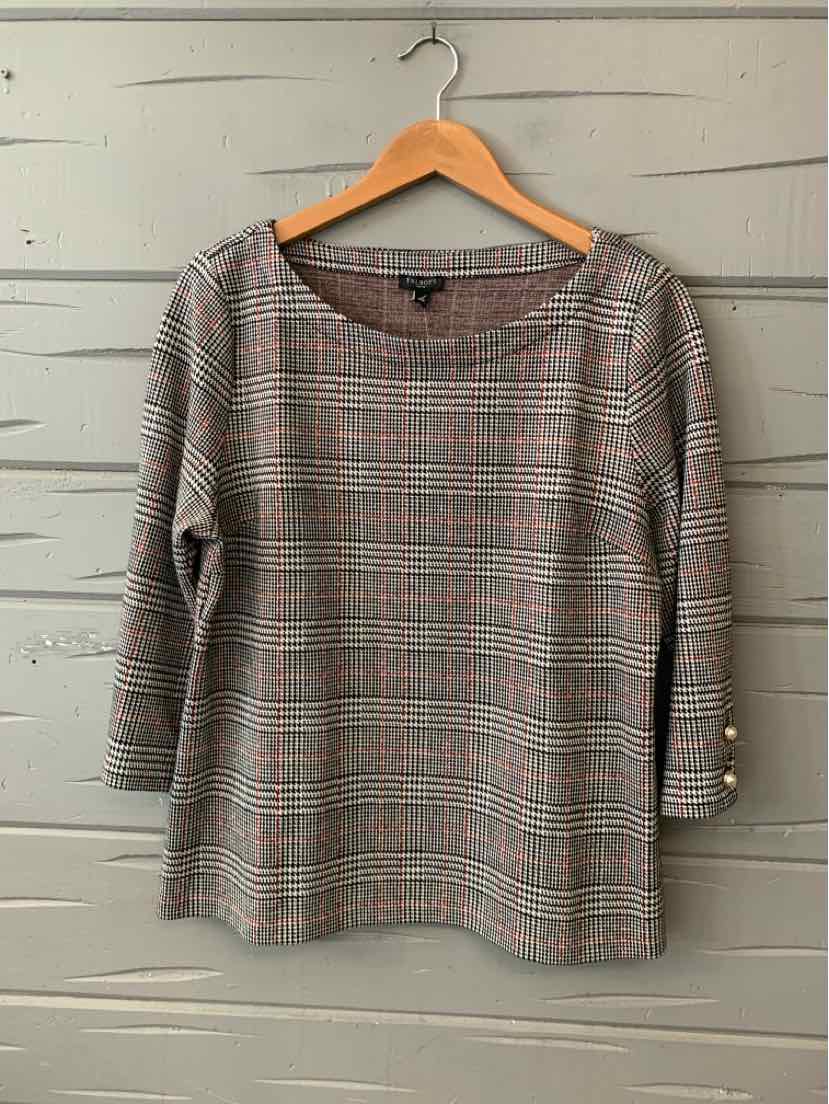 Gray and black houndstooth long-sleeve blouse with scoop neck and button cuffs.