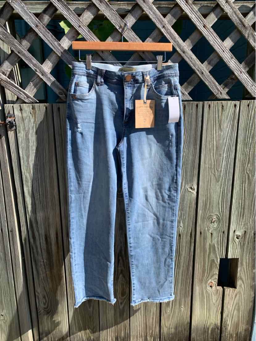 Light blue Democracy denim jeans with straight legs, a frayed hem, and hanging tags.